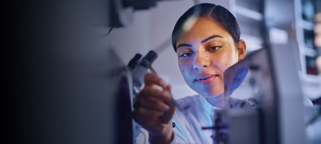 Scientist preparing microscope slides