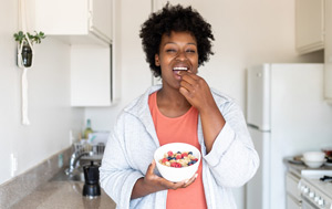 Woman eating cereal 