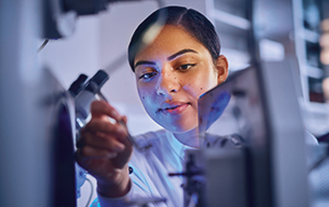 Scientist preparing microscope slides