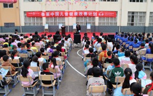 Chinese students at a nutrition education assembly