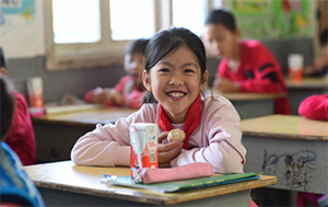 Chinese student with healthy snack