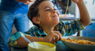 boy eating spaghetti