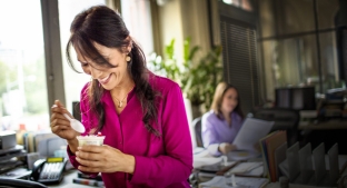 woman eating yoghurt