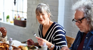 Mature woman eating