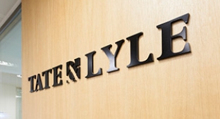 Wall-mounted Tate & Lyle logo