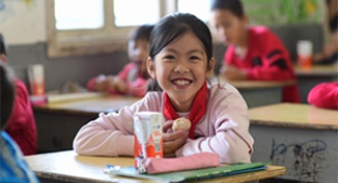 Chinese student with healthy snack