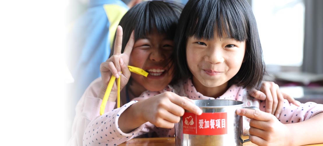 Two smiling Chinese school children