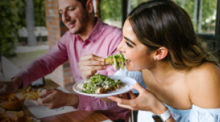 Woman eating crunchy healthy salad Woman eating crunchy healthy salad