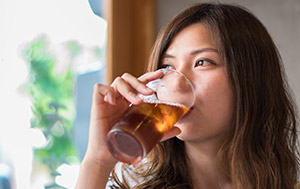 Woman drinking stevia sweetened tea