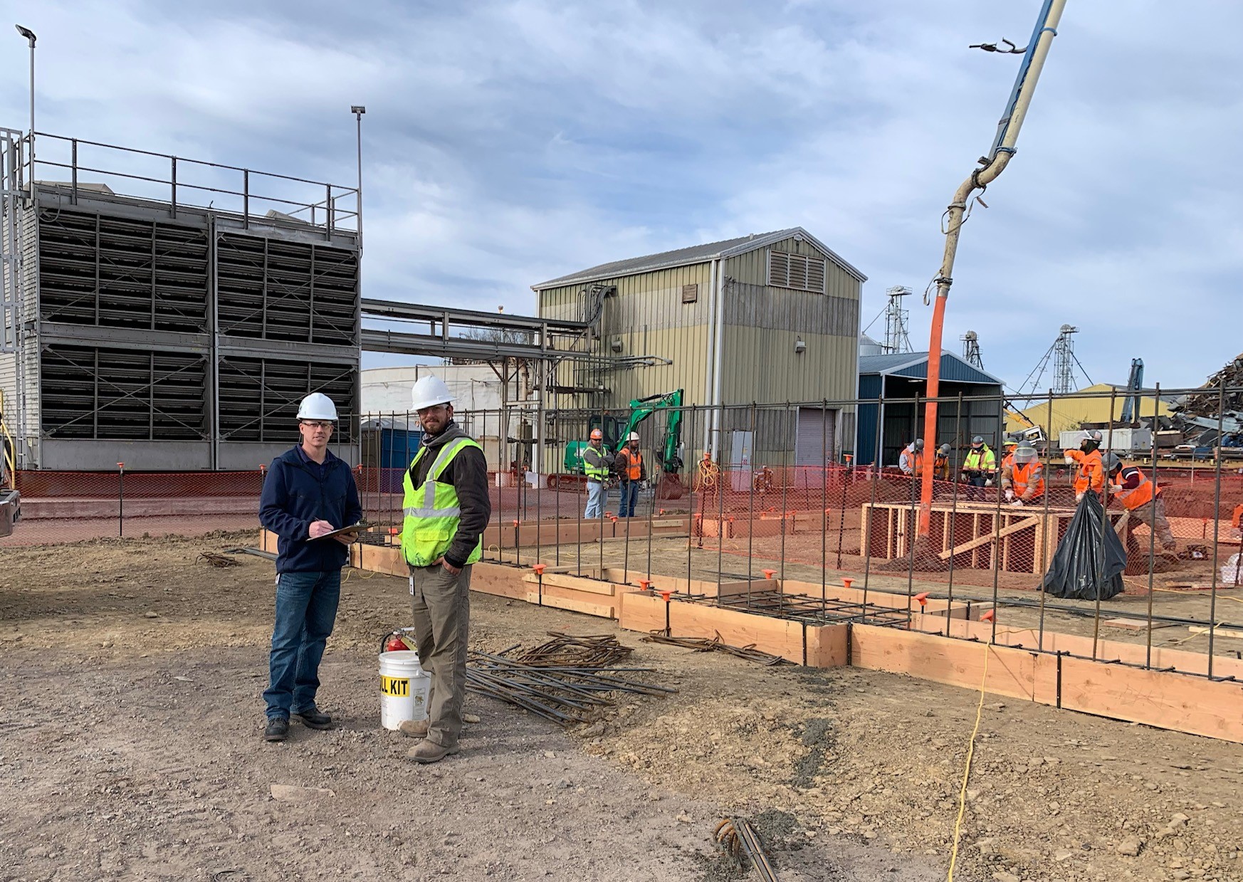 Two workers on site